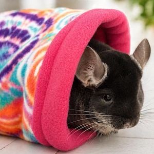 Give your small pets the cozy hideaway they deserve with this Guinea Pig Tunnel Bed, designed for comfort, play, and stress-free snuggling. This soft tunnel creates the perfect safe space. This washable small animal hideout is ideal for guinea pigs, hedgehogs, ferrets, chinchillas, and other small pets.
Features reinforced, structured openings on both ends to help it stay open, making it easy for your pets to enter, exit, and explore. It’s perfect for playtime or nap time.