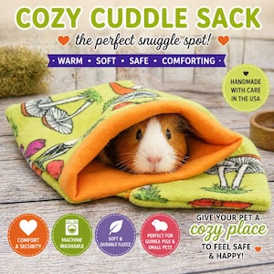 May include: A green fleece cuddle sack with a mushroom print and orange interior lining. A brown and white guinea pig is peeking out from the opening. The text reads COZY CUDDLE SACK, the perfect snuggle spot, WARM, SOFT, SAFE, COMFORTING, and HANDMADE WITH CARE IN THE USA.