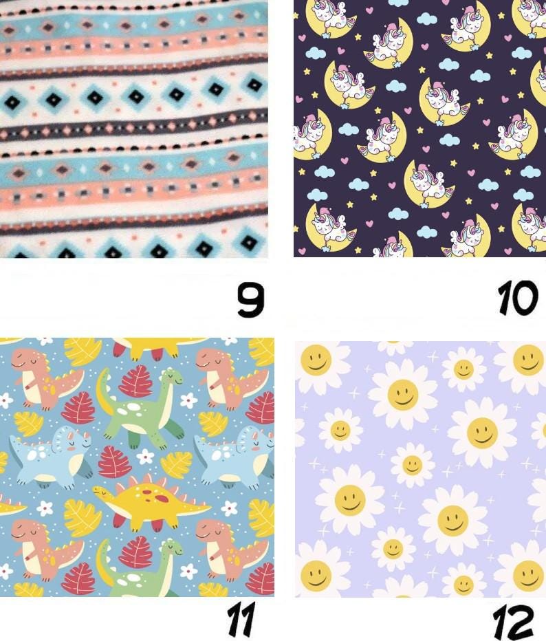 May include: A four-panel fabric collage featuring distinct patterns: top-left shows horizontal stripes with diamonds; top-right displays unicorns on yellow moons against a dark purple background; bottom-left shows colorful dinosaurs; bottom-right shows yellow smiley-faced daisies on a light purple background.