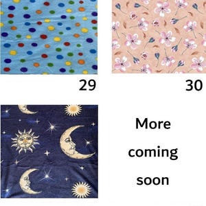 May include: Four fabric swatches with different patterns. One is light blue with colorful polka dots, another is peach with pink flowers, a third is navy blue with moons and stars, and the last one says "More coming soon."