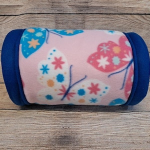 Give your small pets the cozy hideaway they deserve with this Guinea Pig Tunnel Bed, designed for comfort, play, and stress-free snuggling. This soft tunnel creates the perfect safe space. This washable small animal hideout is ideal for guinea pigs, hedgehogs, ferrets, chinchillas, and other small pets.
Features reinforced, structured openings on both ends to help it stay open, making it easy for your pets to enter, exit, and explore. It’s perfect for playtime or nap time.