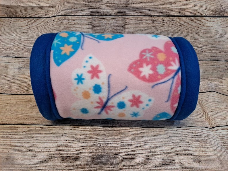 Give your small pets the cozy hideaway they deserve with this Guinea Pig Tunnel Bed, designed for comfort, play, and stress-free snuggling. This soft tunnel creates the perfect safe space. This washable small animal hideout is ideal for guinea pigs, hedgehogs, ferrets, chinchillas, and other small pets.
Features reinforced, structured openings on both ends to help it stay open, making it easy for your pets to enter, exit, and explore. It’s perfect for playtime or nap time.