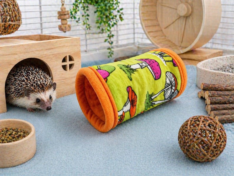 Give your small pets the cozy hideaway they deserve with this Guinea Pig Tunnel Bed, designed for comfort, play, and stress-free snuggling. This soft tunnel creates the perfect safe space. This washable small animal hideout is ideal for guinea pigs, hedgehogs, ferrets, chinchillas, and other small pets.
Features reinforced, structured openings on both ends to help it stay open, making it easy for your pets to enter, exit, and explore. It’s perfect for playtime or nap time.