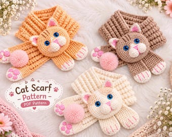 May include: Three crocheted cat scarves in orange, brown, and cream, each featuring a cat head with blue eyes, pink ears, and a pink pom-pom. A white label with the text Cat Scarf Pattern PDF Pattern is visible in the lower left corner.