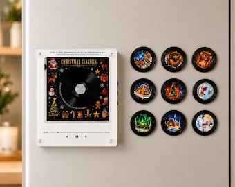 May include: A square acrylic plaque featuring a Christmas Classics music player interface with a central vinyl record graphic, surrounded by holiday icons. Beside it are nine circular magnets displaying various festive winter scenes.