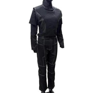 May include: A black long-sleeved top with a high collar and matching black trousers featuring prominent white contrast stitching. The trousers have a structured design with reinforced knee panels and a belt loop waistband, displayed on a mannequin.