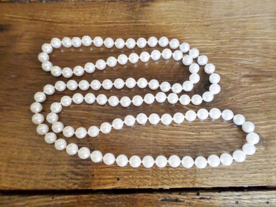 SILVER and PEARL NECKLACE having a row of individually knotted large faux  pearls with a chunky 925