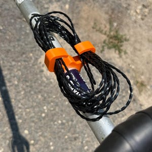 Trimmer Line Holder Clip for Weed Eater Shaft – Universal String Trimmer Line Storage Mount, 3D Printed, Orange