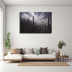 May include: A rectangular wall art print featuring a dark, futuristic cityscape with towering skyscrapers under a cloudy, dramatic sky. The scene depicts a sprawling urban environment with sharp architectural lines, deep shadows, and a central circular structure in the distance, rendered in shades of gray, black, and muted purple tones.