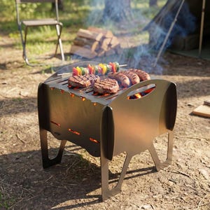 May include: A portable, dark metal charcoal grill with a rectangular firebox and integrated legs. The grill features a top grate holding grilled meat patties, sausages, and vegetable skewers, with visible glowing embers inside the metal structure.