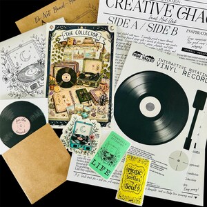 Puede incluir: Una colecci&oacute;n de art&iacute;culos de papeler&iacute;a con temas de m&uacute;sica y discos de vinilo. Incluye una l&aacute;mina "The Collector", una hoja interactiva "High Valley Paper Co." con un disco giratorio, una pegatina de tocadiscos y varias tarjetas con textos como "music soothes my soul" y "currently spinning life."