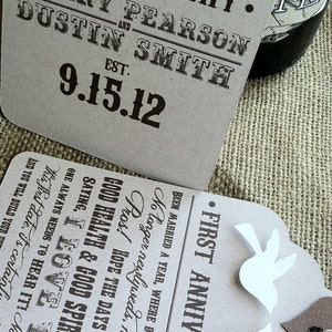 May include: Two brown paper cards with black text. The top card says "Wedding Night. Hilary Pearson and Dustin Smith Est. 9.15.12". The bottom card says "First Anniversary. Been married a year, where did the time go? No longer newlyweds, now you are Pros! Hope the days found you Good Health & Good Spirit! Keep Saying, I Love You - One always needs to hear it! Now you are..."