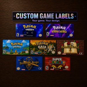 May include: A collection of rectangular custom game labels featuring various video game titles including Pokemon Emerald Rogue, Pokemon Unbound, Pokemon Emerald Seaglass, Pokemon Gaia Version, Rebellion Saga, Andaron Saga, and Super Mariomon.