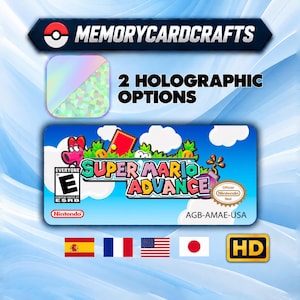May include: A rectangular sticker featuring the Super Mario Advance game label art with a blue sky, white clouds, and green grass. The text reads Super Mario Advance, AGB-AMAE-USA, and includes an ESRB E rating, Nintendo logo, and official seal.