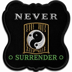 May include: A black embroidered patch with a scalloped edge featuring the silver text NEVER at the top and green text SURRENDER at the bottom. In the center is a gold-outlined rectangular frame containing a black and white yin-yang symbol.