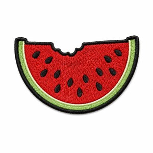 May include: An embroidered patch shaped like a watermelon slice with a bite taken out of the top. The patch features a bright red center with black teardrop-shaped seeds, surrounded by a thin light green rind and a thick black stitched border.