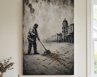 May include: A vertical wall art print depicting a person in a jacket and cap sweeping a collection of metallic clock hands across a cracked stone street. The background features a grayscale urban cityscape with a prominent domed building.