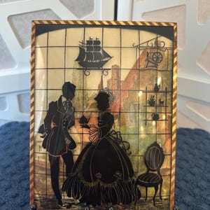 Set of 2 Vintage Reverse Painted Convex Glass Silhouette Picture
