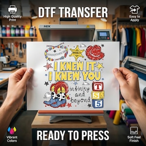 May include: A DTF transfer sheet featuring a colorful graphic with the text I KNEW IT I KNEW YOU infinity and beyond. The design includes a beaded bracelet, a yellow sheriff star, a red cowboy hat, cow-print boots, and three stacked blocks.