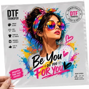 May include: A DTF transfer sheet featuring a colorful illustration of a person with a messy bun, a vibrant headband, and round sunglasses. The text reads Be You Do You For You and Brighter Than Your Excuses, surrounded by paint splatters and hearts.