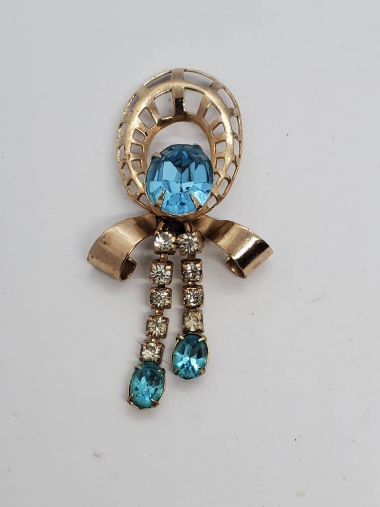 Scitarelli Gold Tone Bow Blue and White Crystal Pin Brooch Pendant