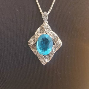 Art Deco Oval Blue Topaz Marcasite And Sterling Silver Pendant Brooch On 24 Inch Sterling Silver Rope Chain