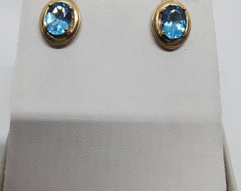 Vintage Oval Blue Topaz And 14 Karat Yellow Gold Stud Earrings