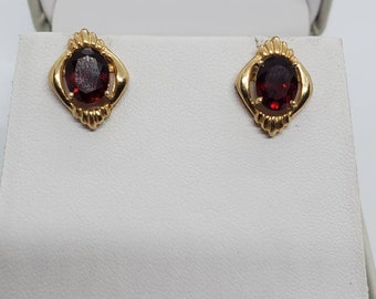 14 Karat Yellow Gold And 2 Carats Each Oval Garnet Earrings TCW 4 Carats