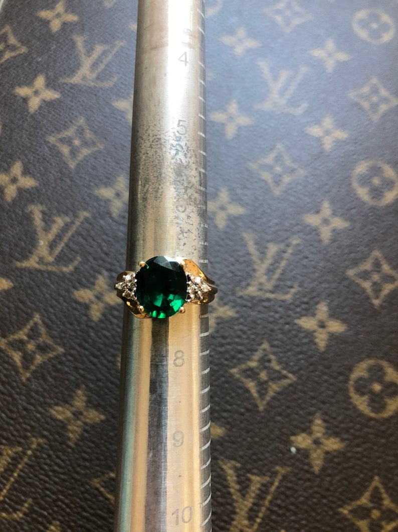 CRP 10k Yellow Gold Emerald and Diamond Ring