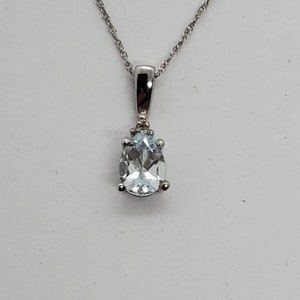 Pear Shaped Aquamarine Pendant Set in 10 Karat White Gold And Comes On 18 Inch Length 10 Karat White Gold Chain