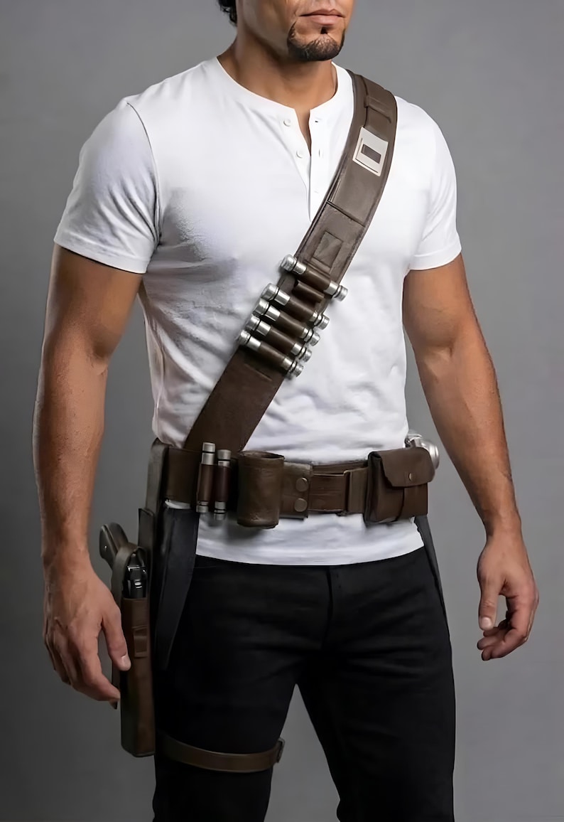 May include: A brown leather bandolier worn diagonally across the chest, featuring silver-toned cylindrical canisters. A matching brown leather utility belt is worn at the waist, equipped with multiple pouches, additional canisters, and a holster.