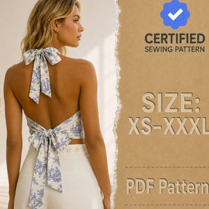 May include: A backless halter top featuring a blue and white toile de Jouy pattern with two large bows at the neck and waist. The image includes text stating CERTIFIED SEWING PATTERN, SIZE: XS-XXXL, and PDF Pattern on a textured brown background.