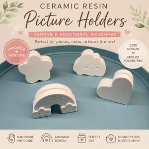 May include: Four white ceramic resin picture holders in the shapes of a flower, a smiling cloud, a rainbow, and a heart. The text CERAMIC RESIN Picture Holders is visible at the top, along with various promotional phrases and icons.