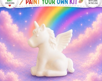 May include: A white ceramic resin unicorn figurine with wings, presented as part of a paint your own kit. The text reads TRUBLU ART CREATIONS, CERAMIC RESIN PAINT YOUR OWN KIT, and HANDMADE WITH CARE IN THE USA, featuring icons of a paintbrush and palette.