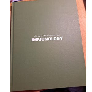 May include: A green hardback book with the title "Scope Monograph on IMMUNOLOGY" printed in white.