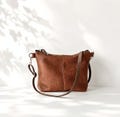 Medium Vegan Leather Crossbody Bag, Cognac Brown Shoulder Purse with adjustable strap, Casual everyday women's bag product logo