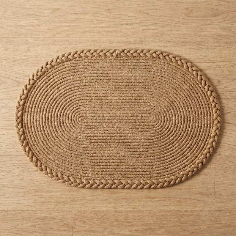 Brown rug jute rug, bath mat, home decor, welcome mat, small rug, cool rug, abstract rug, outdoor rug, mid century rug, handmade rug, bath rug, hand tufted rug, area rug, living room rug, bedroom rug, entryway rug, floor rug, modern rug, accent rug, woven rug, decorative rug, boho rug, farmhouse decor, cozy home decor, indoor outdoor rug, natural fiber rug, soft rug, stylish floor covering, housewarming gift, home accessory.