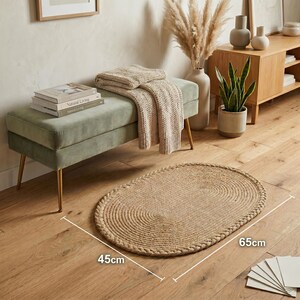 Brown rug jute rug, bath mat, home decor, welcome mat, small rug, cool rug, abstract rug, outdoor rug, mid century rug, handmade rug, bath rug, hand tufted rug, area rug, living room rug, bedroom rug, entryway rug, floor rug, modern rug, accent rug, woven rug, decorative rug, boho rug, farmhouse decor, cozy home decor, indoor outdoor rug, natural fiber rug, soft rug, stylish floor covering, housewarming gift, home accessory.
