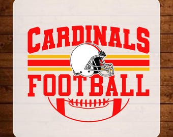 May include: A DTF transfer sheet featuring the text READY TO PRESS at the top and DTF TRANSFER at the bottom. The center graphic displays the words CARDINALS FOOTBALL in red block letters with a white football helmet and a red football outline.