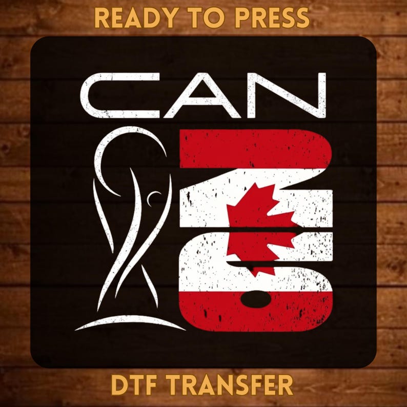 May include: A DTF transfer graphic featuring the text READY TO PRESS at the top and DTF TRANSFER at the bottom. The central design displays the word CAN in white and the number 26 with the Canadian flag pattern in red and white, alongside a trophy icon.