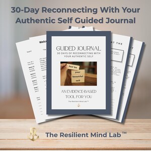 May include: A 30-day guided journal with a dark blue border and white pages. The cover features the text Guided Journal 30 Days of Reconnecting With Your Authentic Self, an image of wooden blocks reading Just be your beautiful self, and The Resilient Mind Lab.