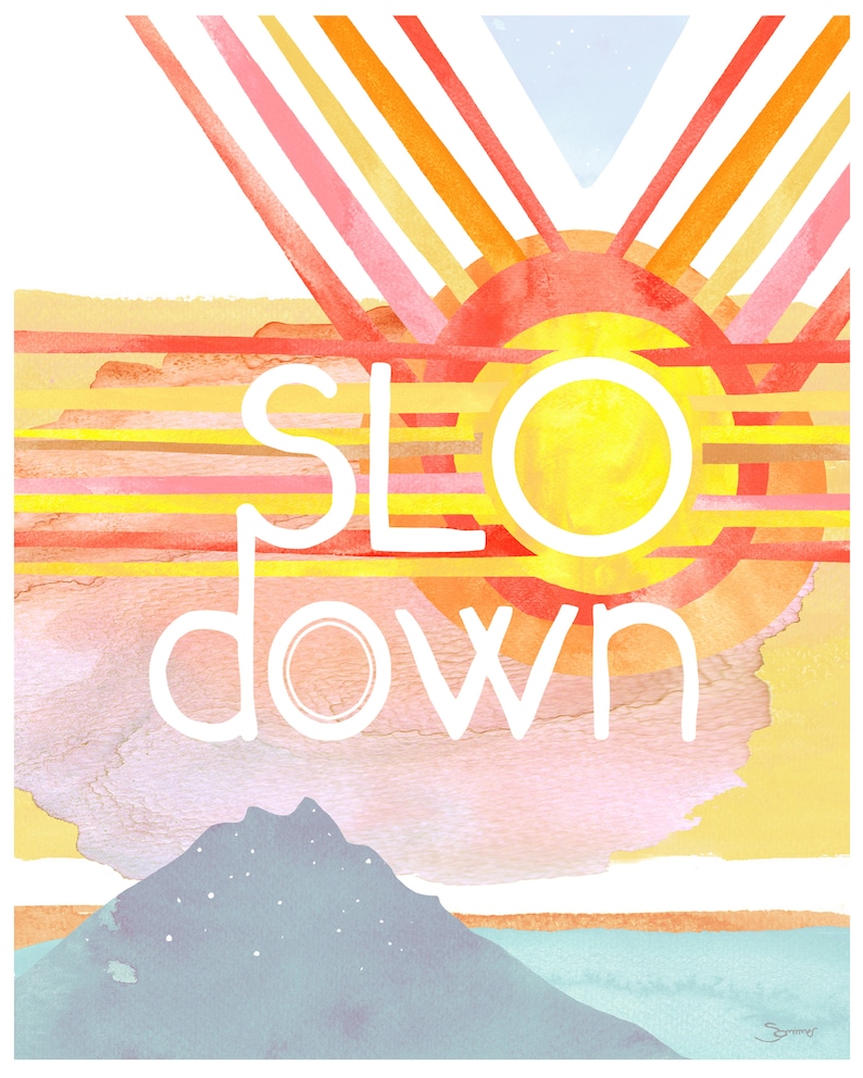 May include: A watercolor painting of a sunset with the words "SLO DOWN" in white text. The painting features a stylized sun with a yellow center and orange and red outer rings. The background is a gradient of pink, orange, and yellow.