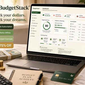 May include: A laptop displaying the BudgetStack financial dashboard software, featuring a Budget Health Score of 80, income, expense, and savings data. Beside the laptop are stacks of cash, a calculator, a debit card, and a budget planner notebook.