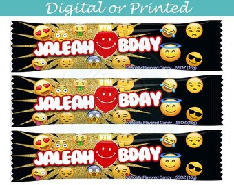 May include: Three black and gold candy bar wrappers with emoji designs. The wrappers say "JALEAH 7TH BDAY" and "Artificially Flavored Candy 55OZ (16g)".