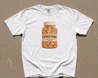 Maglietta con gatto e catacetamolo, maglietta con grafica di un gattino arancione e una boccetta di pillole, divertente meme di animali, colori vintage rilassanti, regalo per amanti dei gatti, regalo per proprietari di animali domestici