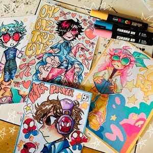 May include: Four colorful anime-style illustrations featuring characters with vibrant hair and outfits, including text reading "OH! ONE TRUE LOVE" and "PETER PARKER". Three Uni Posca paint markers in yellow, blue, and pink are placed at the top right.