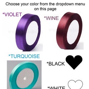 May include: Assortment of satin ribbon spools in various colors, including violet, wine, turquoise, black, and white. The ribbon is 3/4 inch wide.