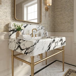 Handcrafted Calacatta Lilac marble bathroom vanity sink with bold natural gray and charcoal veining, seamless integrated marble basin, premium brushed brass console frame, matching marble backsplash, and luxury designer bathroom décor, creating an elegant focal point for upscale residential bathrooms, custom renovations, and boutique hospitality interiors.