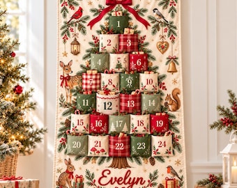 May include: A cream-colored fabric wall hanging advent calendar featuring a printed Christmas tree design with twenty-four numbered pockets. The tree is decorated with illustrations of birds, a deer, a squirrel, and a rabbit, with the name Evelyn embroidered at the bottom.