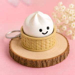 Portachiavi Smiley Bun Dim Sum, giocattolo antistress clicker, ciondolo a forma di cibo kawaii, borsa sensoriale per ADHD
